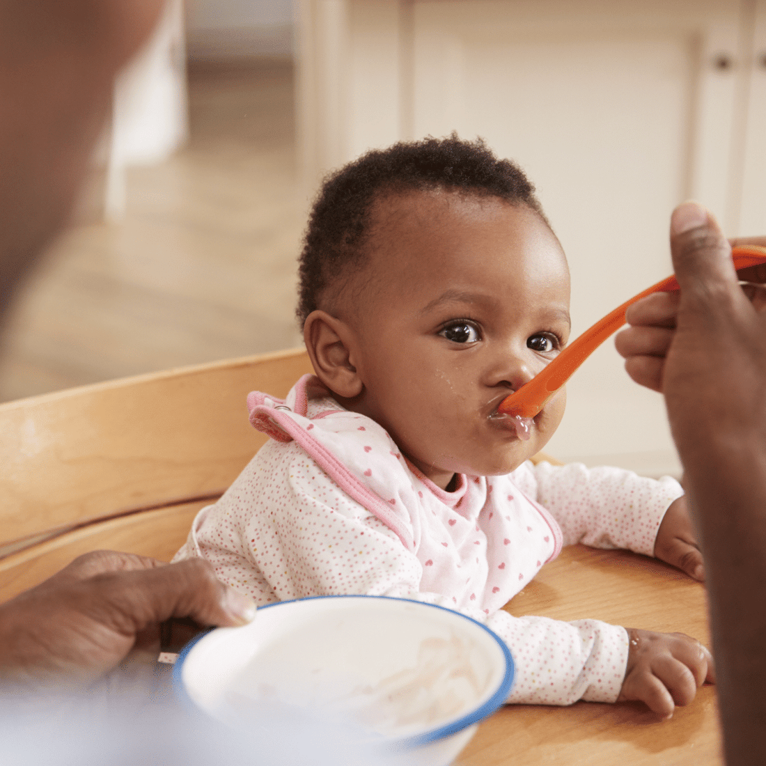 Baby eating baby food