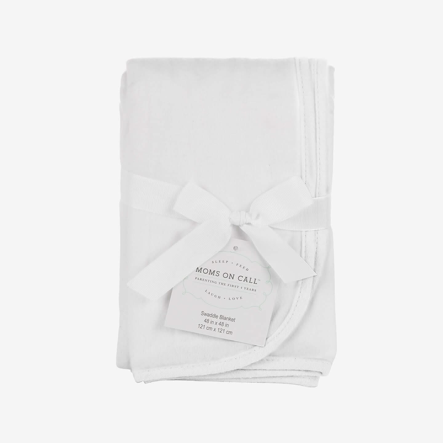folded white swaddle blanket with ribbon