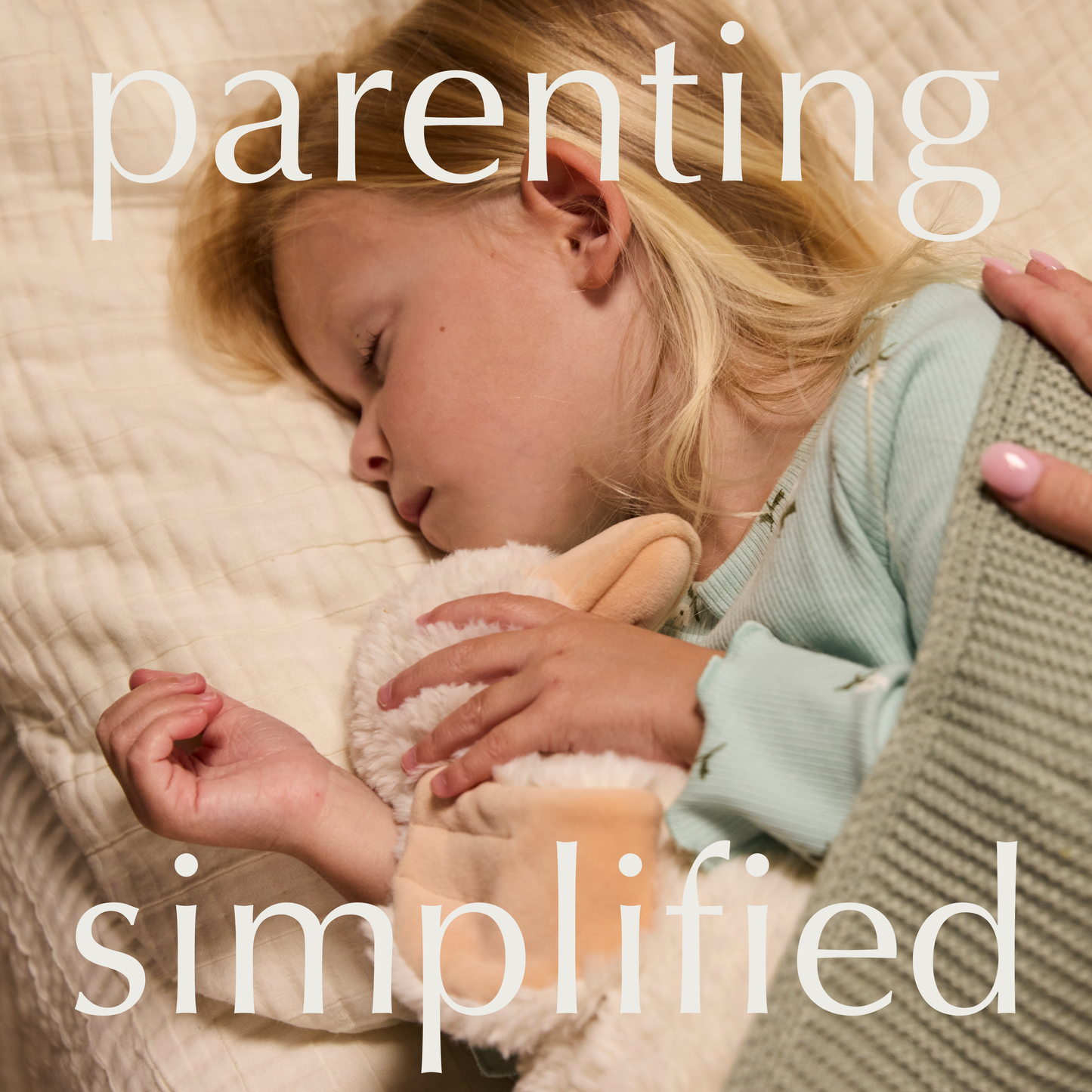Child holding a teddy bear with text 'parenting simplified' on a soft background