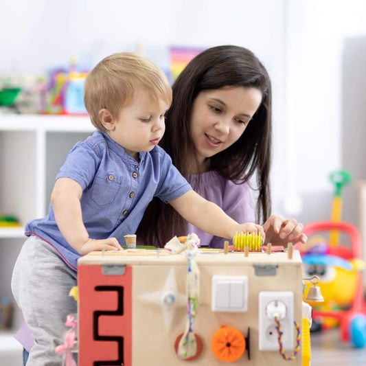 teacher and toddler playing