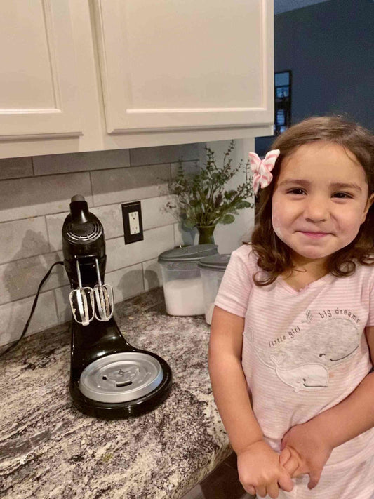 Toddler assisting with cooking