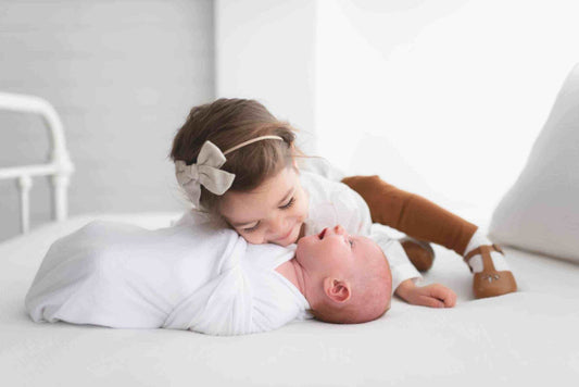 toddler and newborn