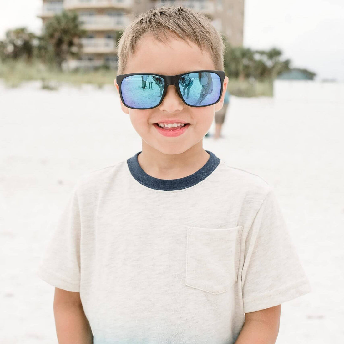 boy smiling on the beach