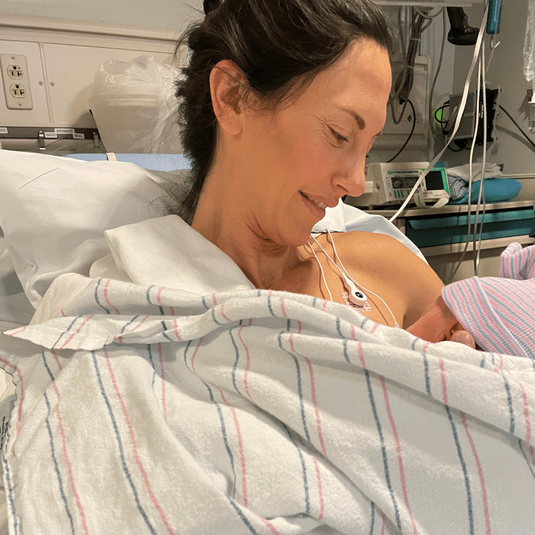 Mother and newly delivered baby in hospital