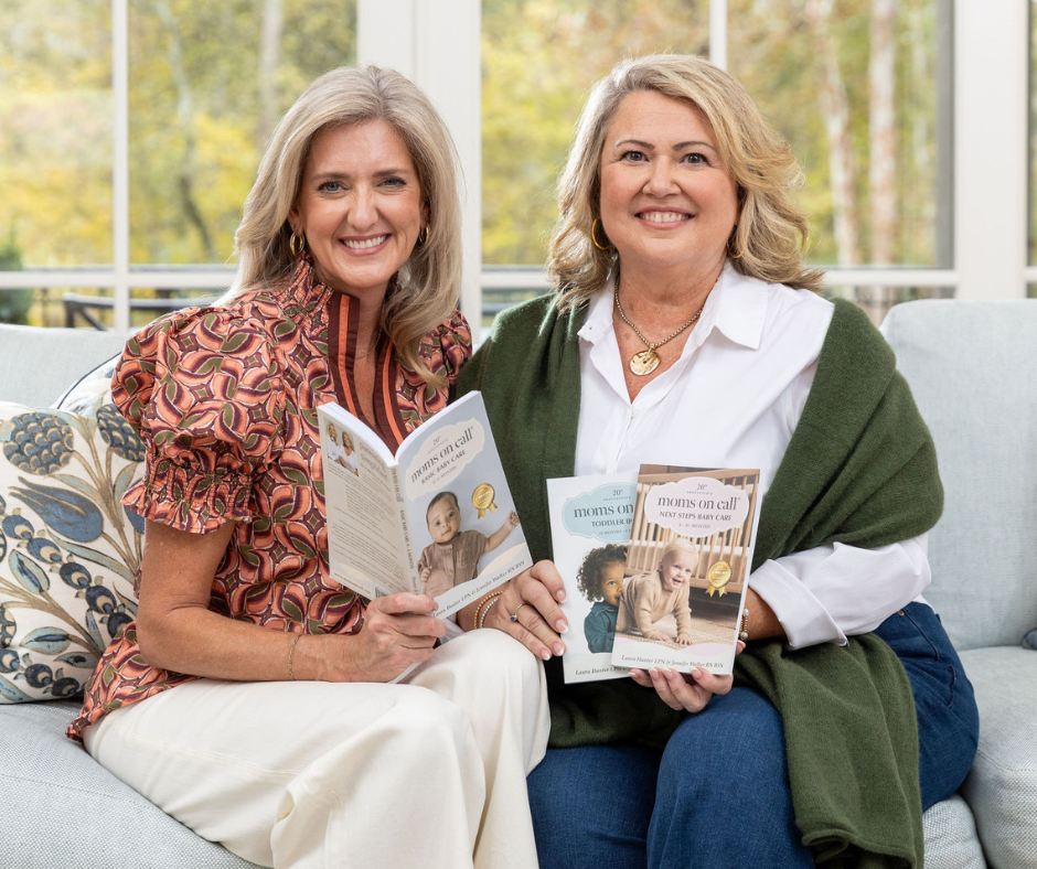 moms on call co founders holding the books