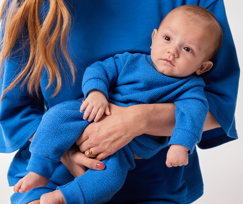mom holding baby