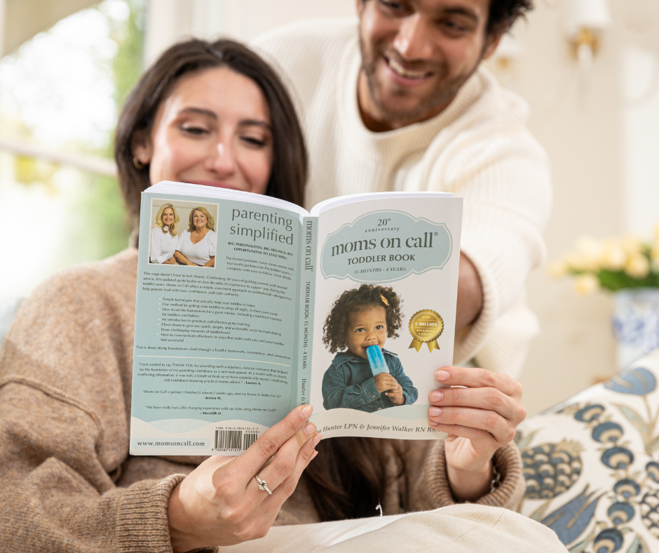 mom and dad reading the toddler book