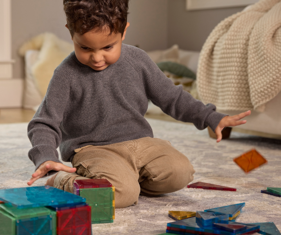 toddler playing with toys