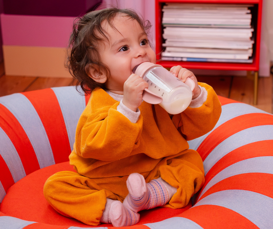 toddler with a sippy cup