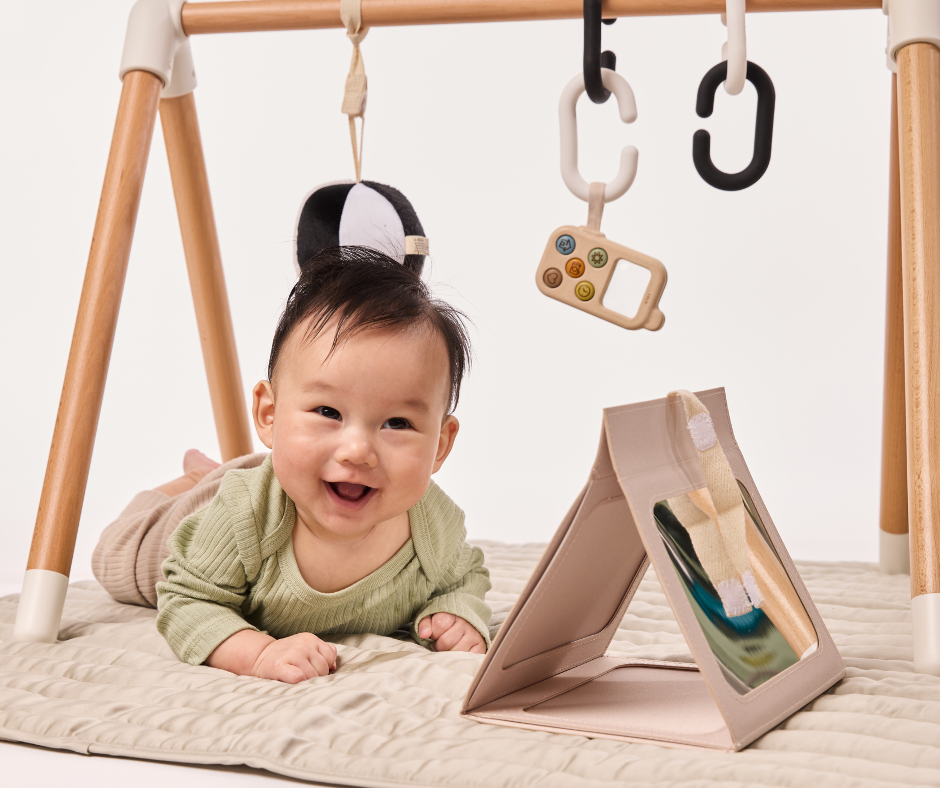 baby playing on the play mat