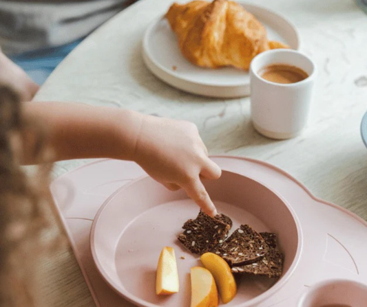 toddler eating snack