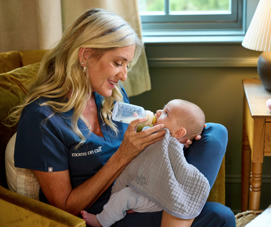 newborn with bottle