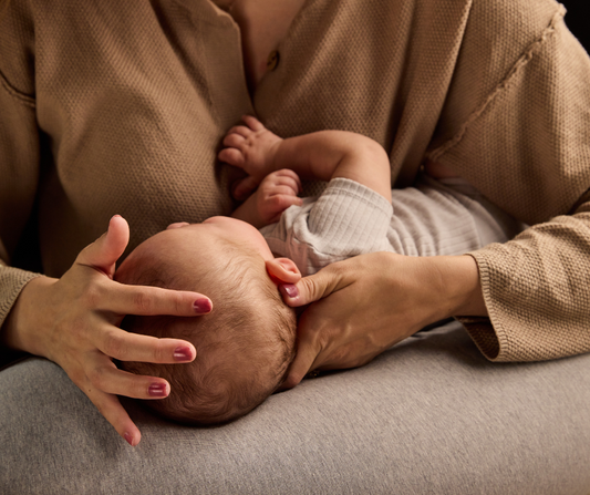 mom holding newborn 