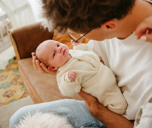 dad holding newborn
