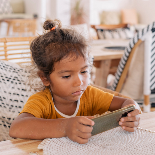 toddler looking at screen