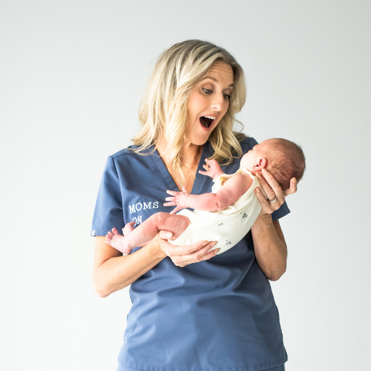 Laura holding a baby