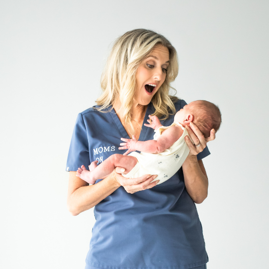 Laura holding a baby