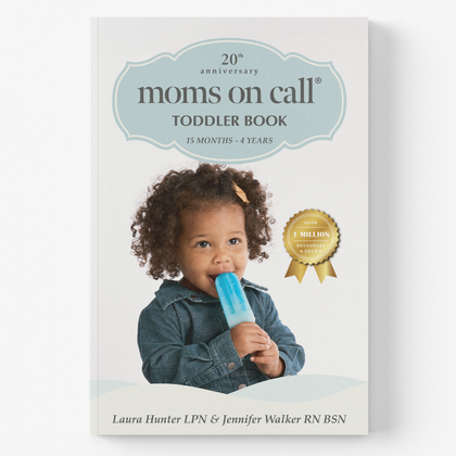 Book titled '20th anniversary moms on call TODDLER BOOK' with a child holding a popsicle on the cover.