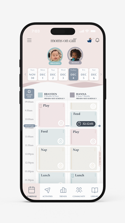 Phone screen displaying moms on call childcare app with baby monitoring features.