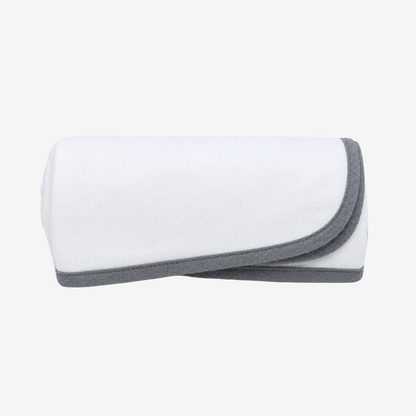 A folded white Moms on Call baby swaddle with a contrasting dark gray border, shown on a clean white background.