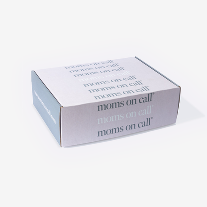 Gift box with 'moms on call' text on a white background